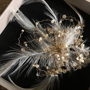 Stunning feather hairpiece